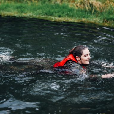GMOOH   girl swimming in pond