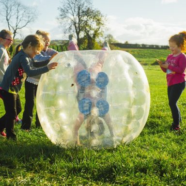 Body Zorbs   girl upside down in Body Zorb