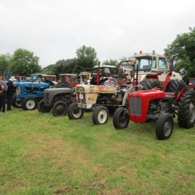 Mid Ulster Vintage rally tractors in a line 2